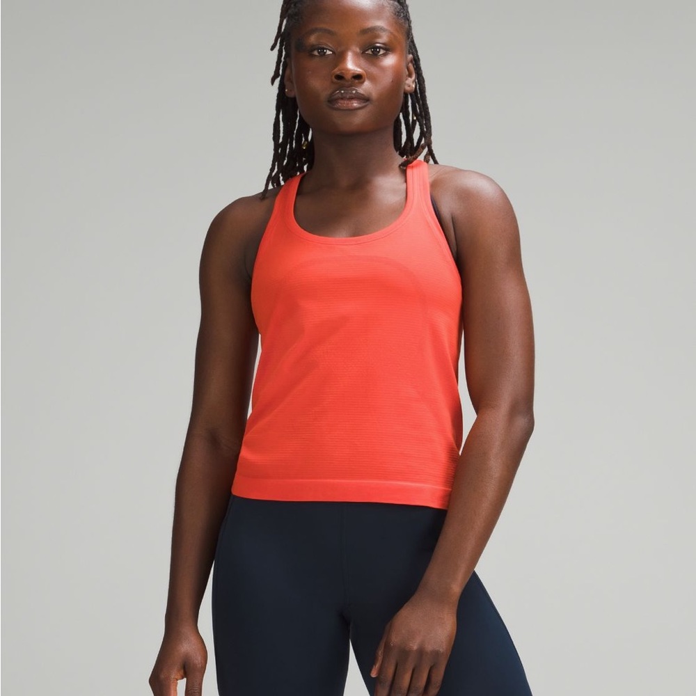 Lululemon Swiftly race length tank in Solar Orange size 6